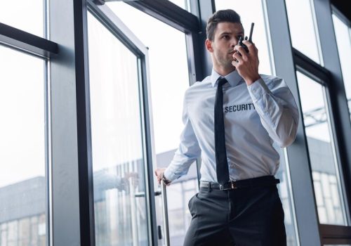 handsome-guard-suit-talking-walkietalkie_656932-219