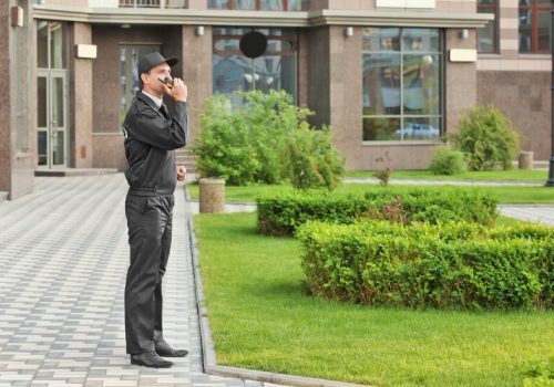 male-security-guard-with-portable-radio-outdoors_392895-18887