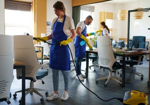 professional-cleaning-service-person-using-vacuum-cleaner-office_23-2150520631